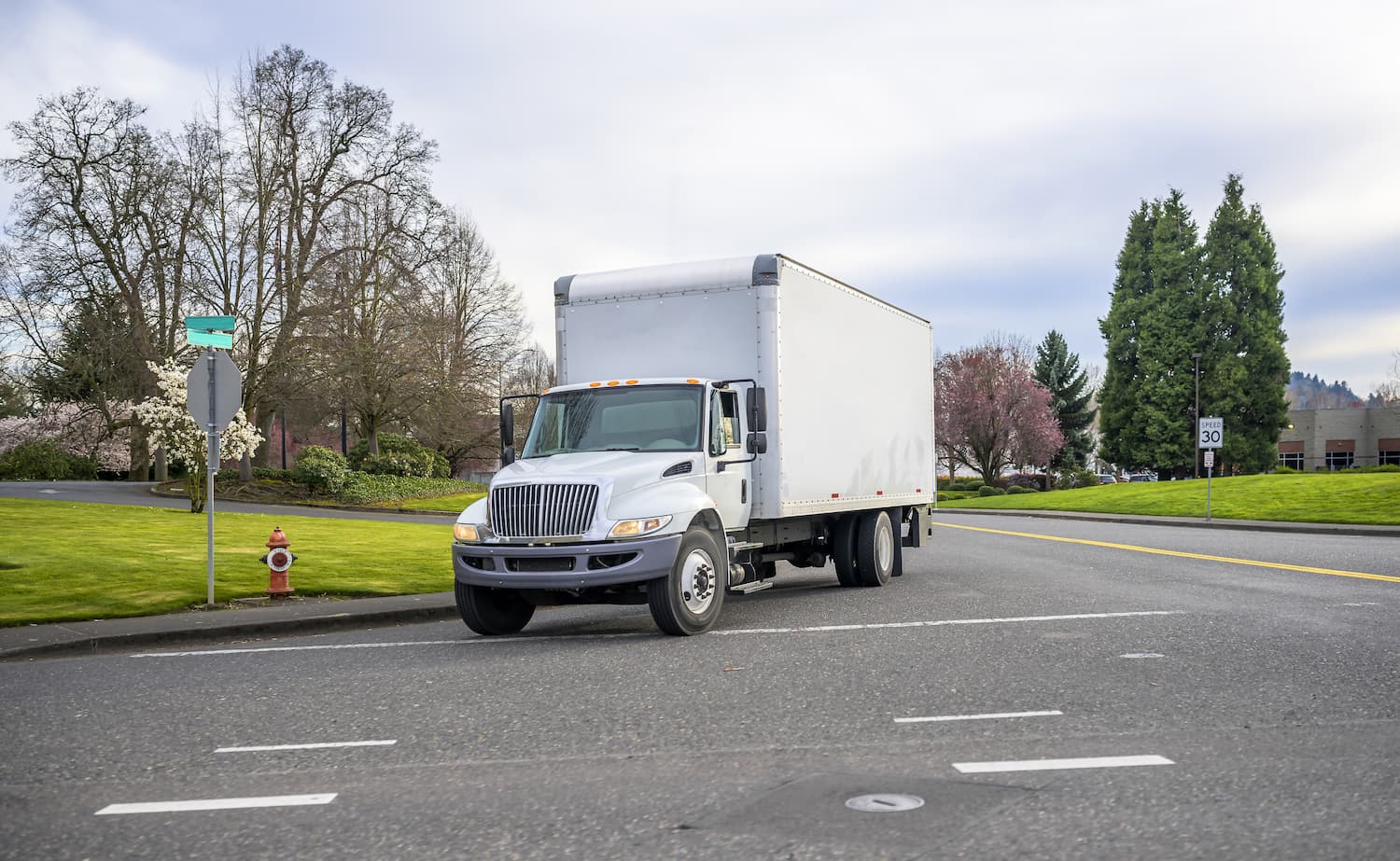 Truck on a road in the spring