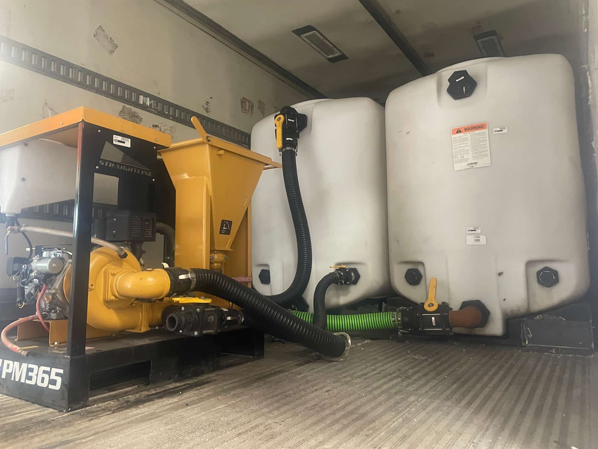 Water tanks in a box truck